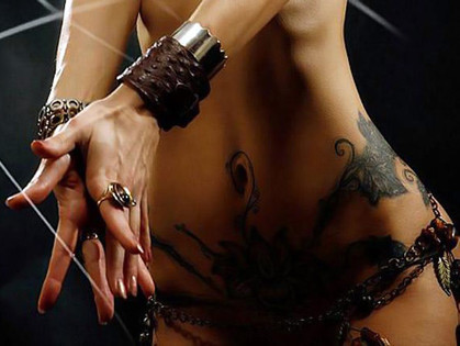 Тату на женском теле - красота или уродство?